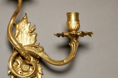 Pair of two-light Regence period wall lights