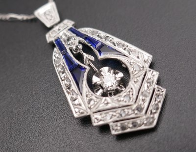 Important Art Deco Pendant with Calibrated Diamonds and Sapphires.