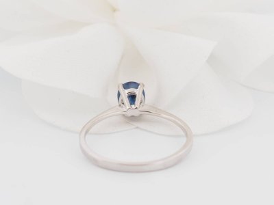 White gold and oval sapphire solitaire ring