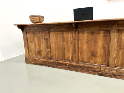 Large old trading counter in solid pine