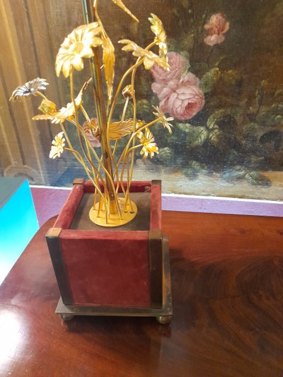 lamp decorated with gilded metal flower stems