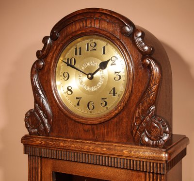  German Art Nouveau / Art Deco Black Forest oak long clock circa 1900-20.