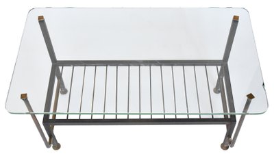 Metal coffee table with glass top in the style of Pierre Guariche