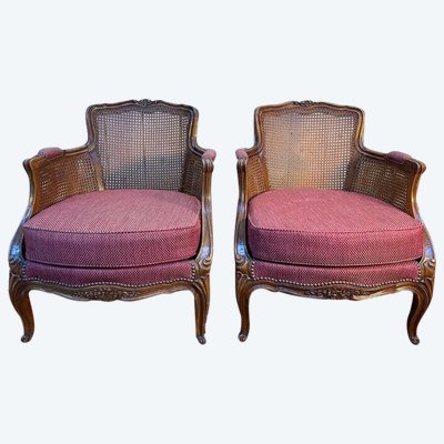 Paire de fauteuils - bergères de style Louis XV en cannage 