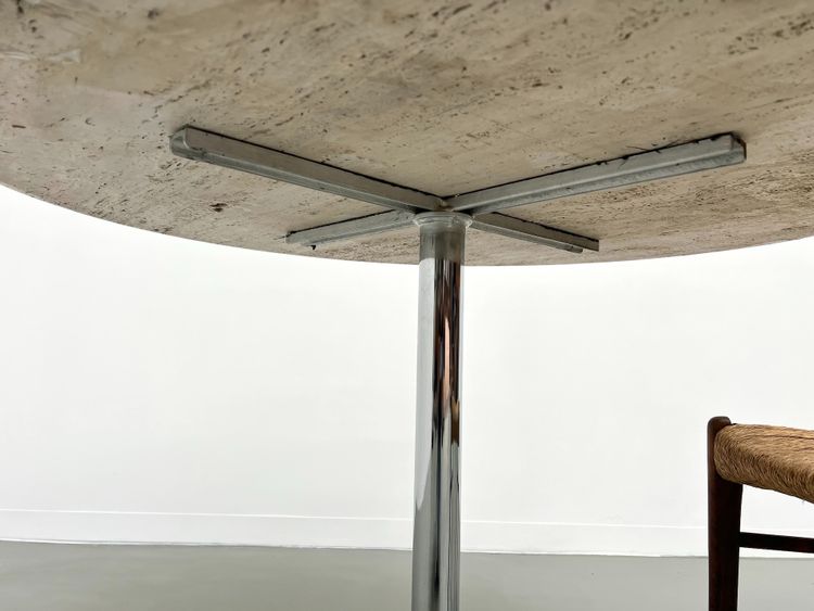 Round travertine marble dining table with chrome base, 1970s.