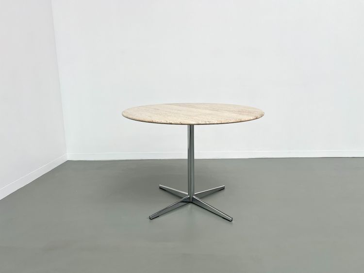 Round travertine marble dining table with chrome base, 1970s.