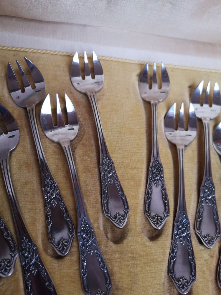 12 silver-plated empire-style oyster forks