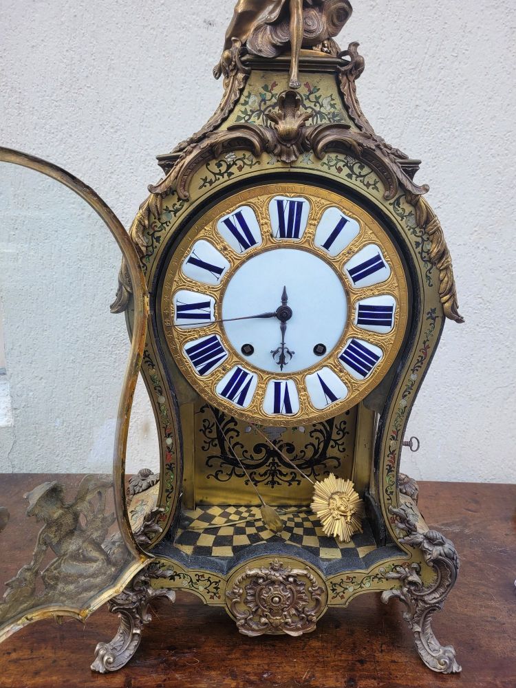 Orologio Cartel "Boulle" con la sua consolle da parete, XVIII secolo