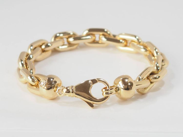 Bracciale a catena in oro giallo e diamanti