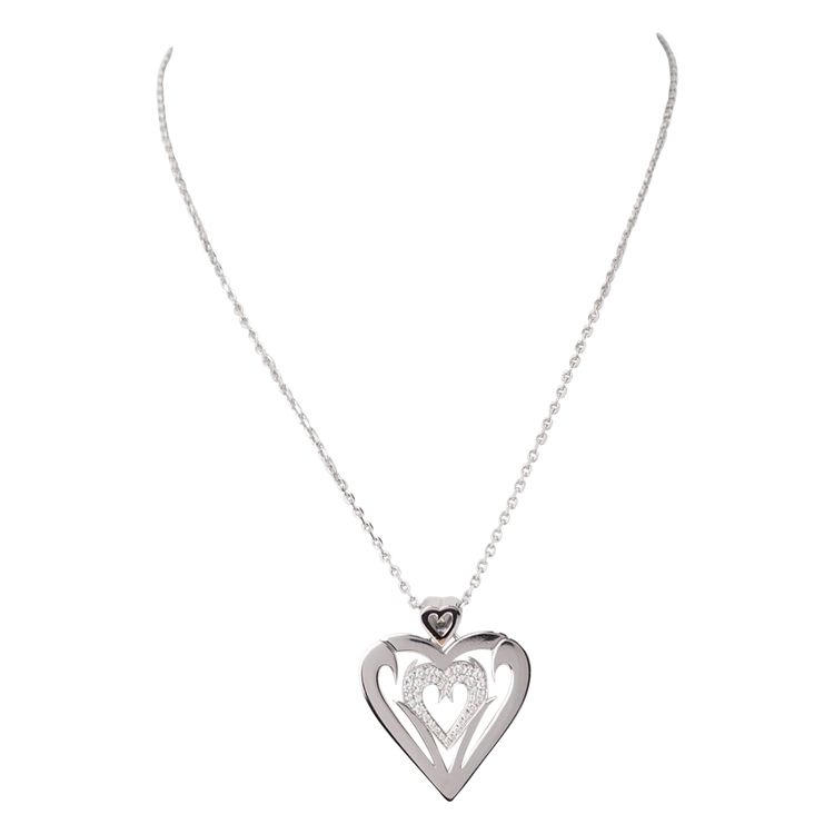 Collier coeur en or blanc et diamants