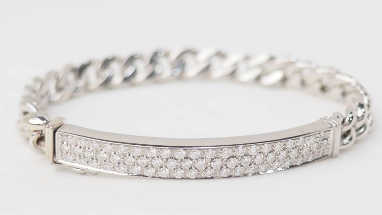 Flexible bracelet in white gold paved with diamonds