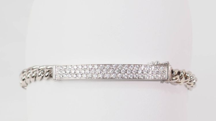 Flexible bracelet in white gold paved with diamonds