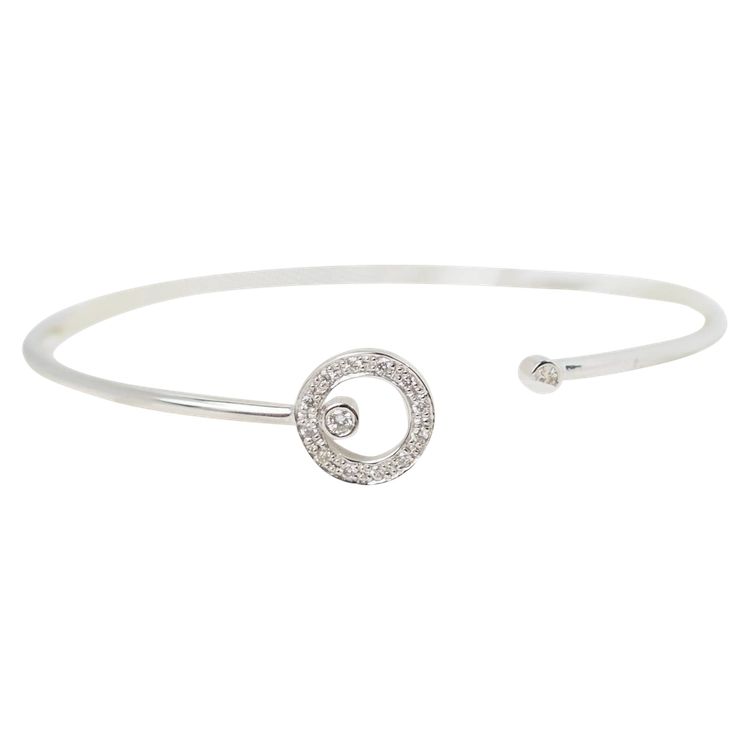 Flexible bangle bracelet in white gold and diamonds