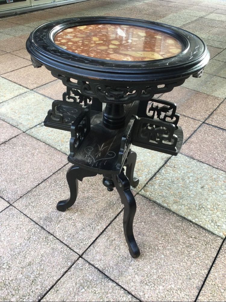 A pedestal table in blackened wood, Napoleon III period