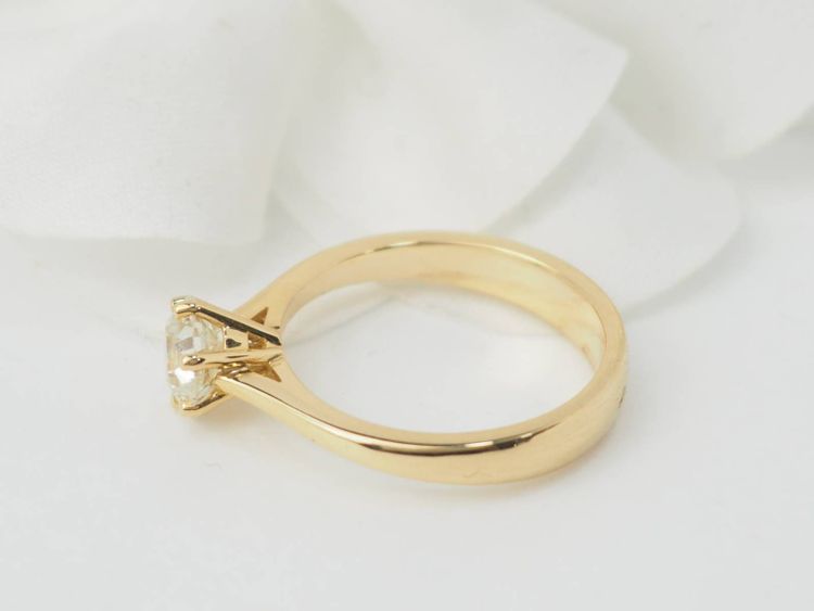 Yellow gold and 0.96ct diamond solitaire ring