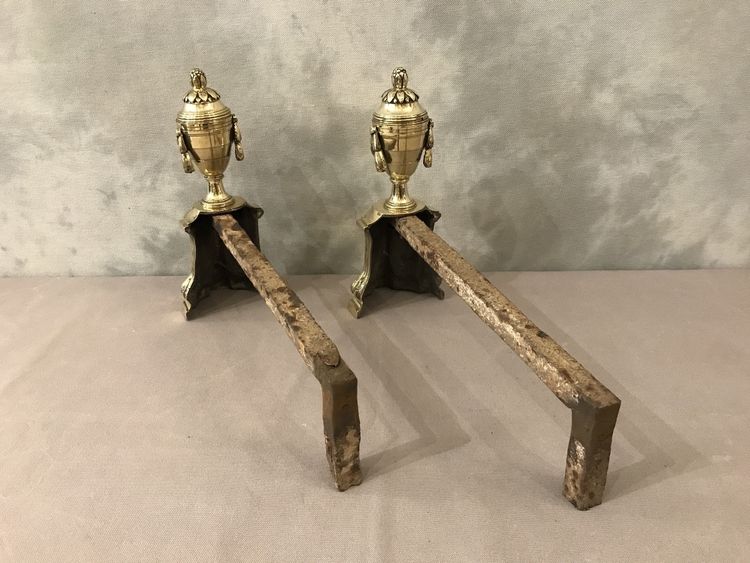 Pair of antique bronze andirons from the 19th century in Louis XVI style