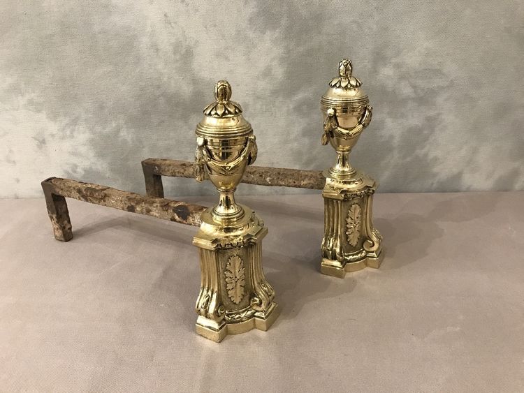 Pair of antique bronze andirons from the 19th century in Louis XVI style