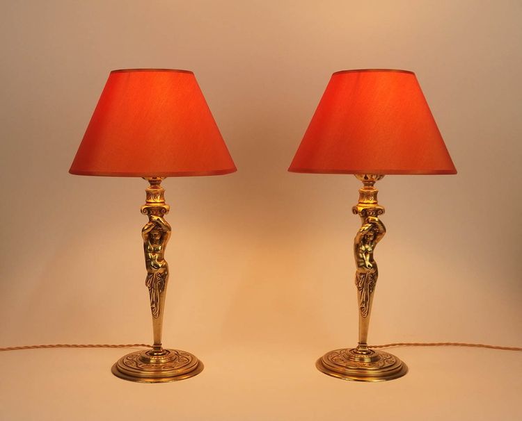 Paar bronzene "Atlantische" Lampen