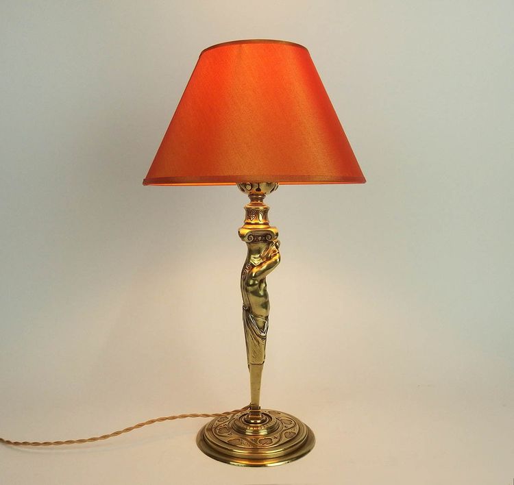 Paar bronzene "Atlantische" Lampen