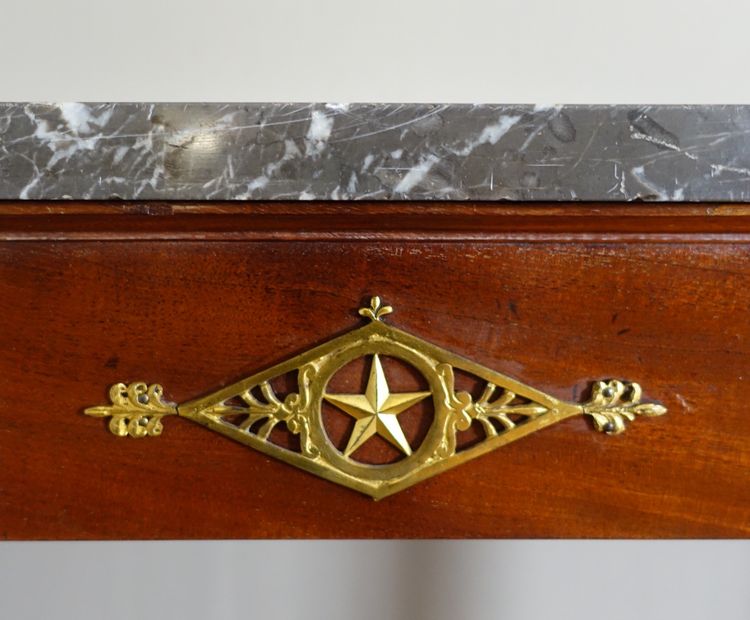 Consulate period console in mahogany and mercury-gilt bronze