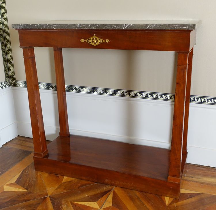 Consulate period console in mahogany and mercury-gilt bronze