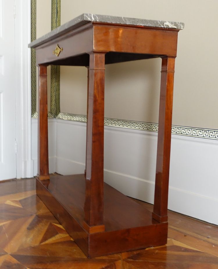 Consulate period console in mahogany and mercury-gilt bronze