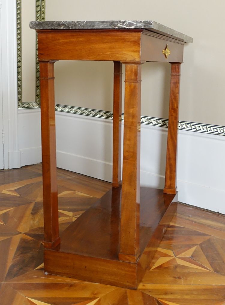 Consulate period console in mahogany and mercury-gilt bronze