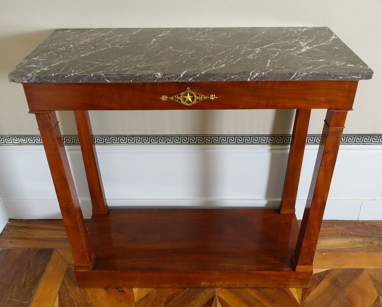 Consulate period console in mahogany and mercury-gilt bronze