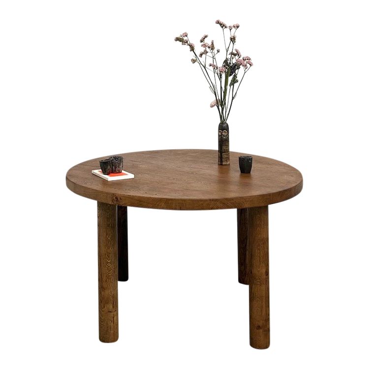 Circular solid oak dining table, circa 1950