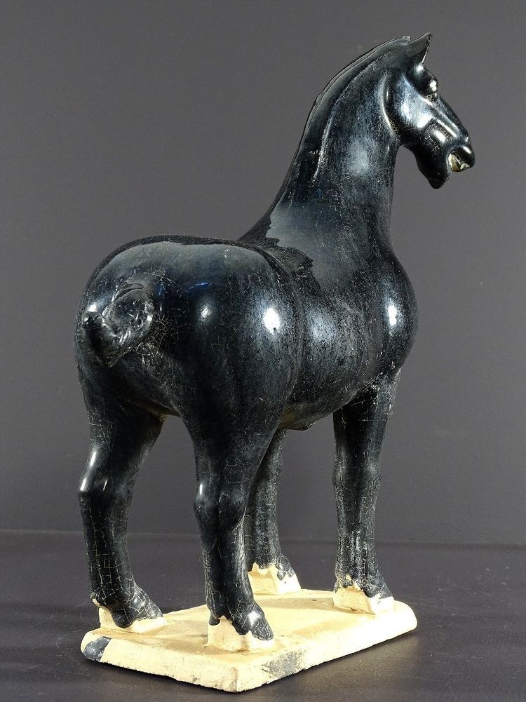 China, 1960s/1970s, Glazed Earthenware Sculpture Depicting a Horse in the Tang Dynasty Style.