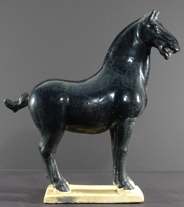 China, 1960s/1970s, Glazed Earthenware Sculpture Depicting a Horse in the Tang Dynasty Style.