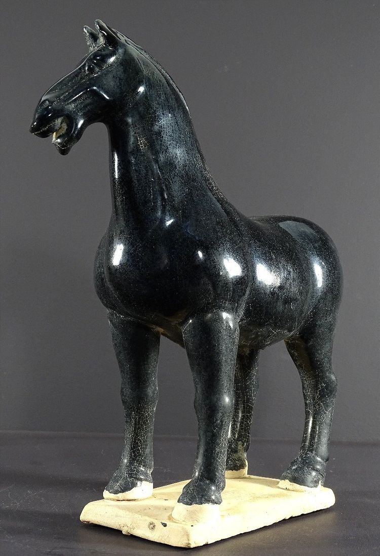 China, 1960s/1970s, Glazed Earthenware Sculpture Depicting a Horse in the Tang Dynasty Style.