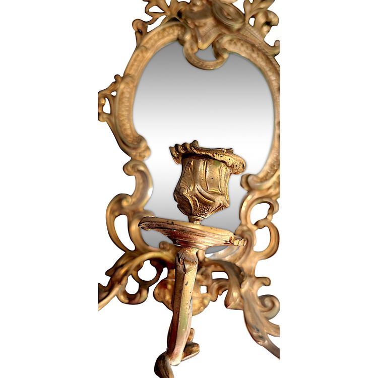 Pair of rococo style wall lights in gilded bronze and mirror