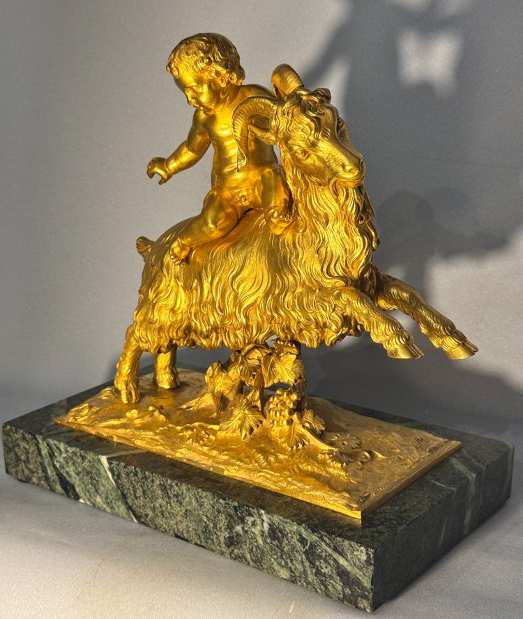 Gilded bronze sculpture Bacchus or putto on a goat 19th century