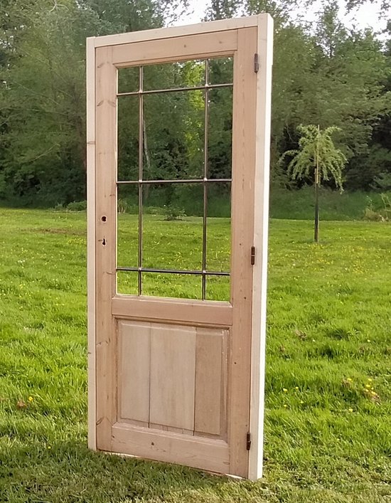 Old Wood And Metal Door With Its Door Frame