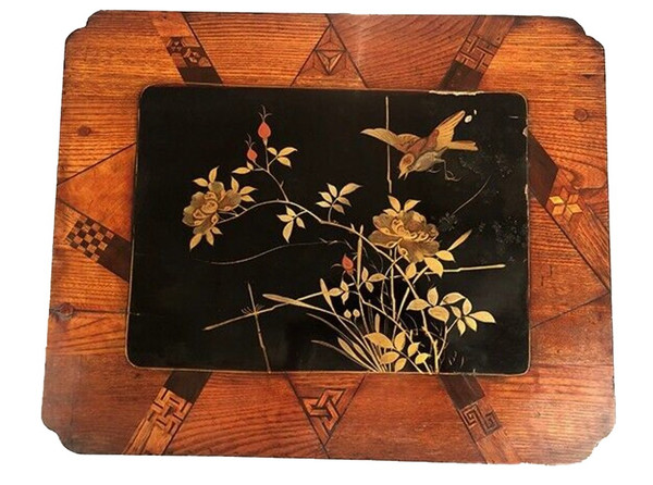 Set of three nesting tables, lacquered and decorated with birds and marquetry. Circa 1900