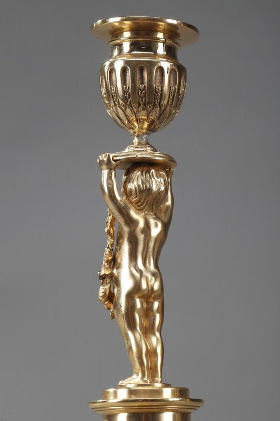 Gilded Bronze Pedestal Candleholders with Putti decoration, 19th Century