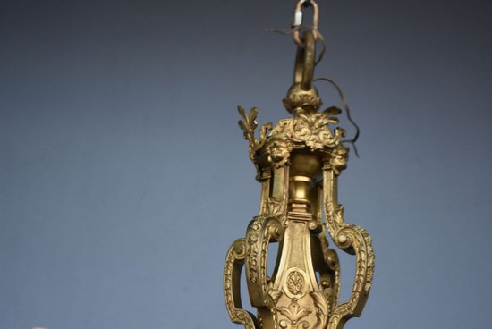             Magnifico lampadario Luigi XIV Napoleone III con teste in bronzo dorato