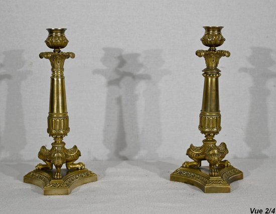 Pair of bronze candlesticks, Restoration period - Early 19th century