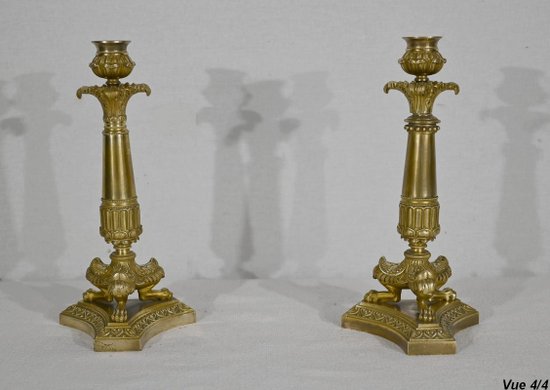 Pair of bronze candlesticks, Restoration period - Early 19th century