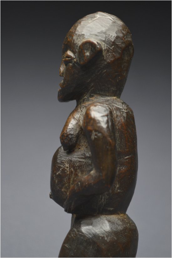 Tanzania, Zigwa people, Mid 20th century, Ancient anthropomorphic statuette with shiny patina