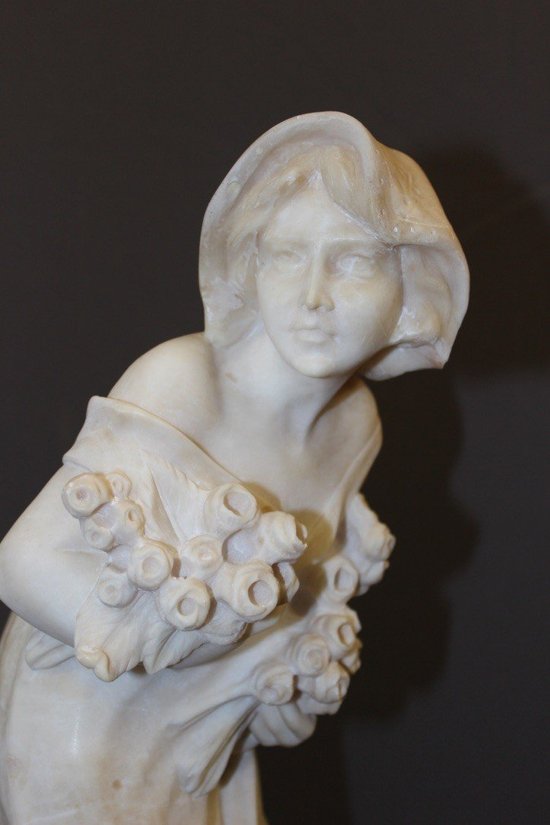 Alabaster Sculpture of a Young Woman with Roses About 1900