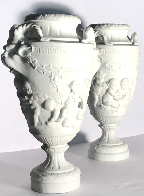 Pair of cookie vases after Clodion