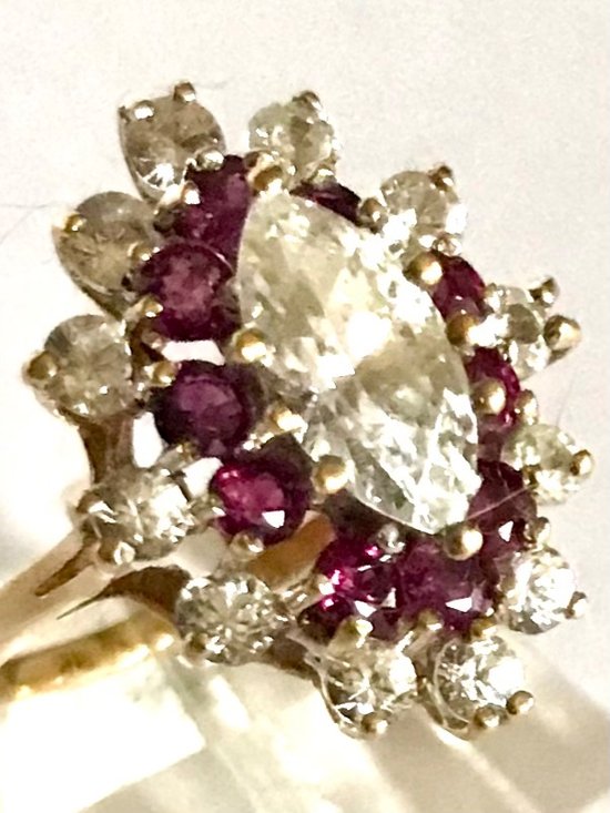 Marquise ring in gold, ruby, and circonium oxide