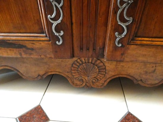 Sideboard with 2 drawers and 2 doors in molded walnut. Provencal work XVIIIth century