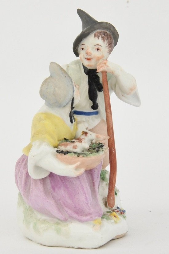 Group in polychrome porcelain of Vienna representing a couple of peasants 18th century