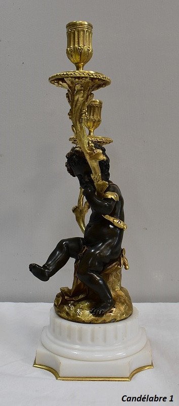 Pair of bronze candelabras "A Love and a Faun", after Clodion and Delarue - End of XIXth century