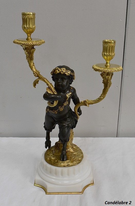 Pair of bronze candelabras "A Love and a Faun", after Clodion and Delarue - End of XIXth century