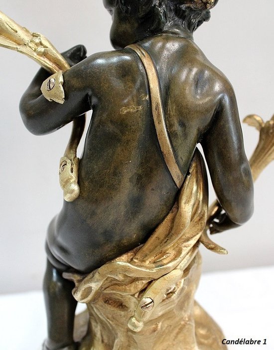 Pair of bronze candelabras "A Love and a Faun", after Clodion and Delarue - End of XIXth century