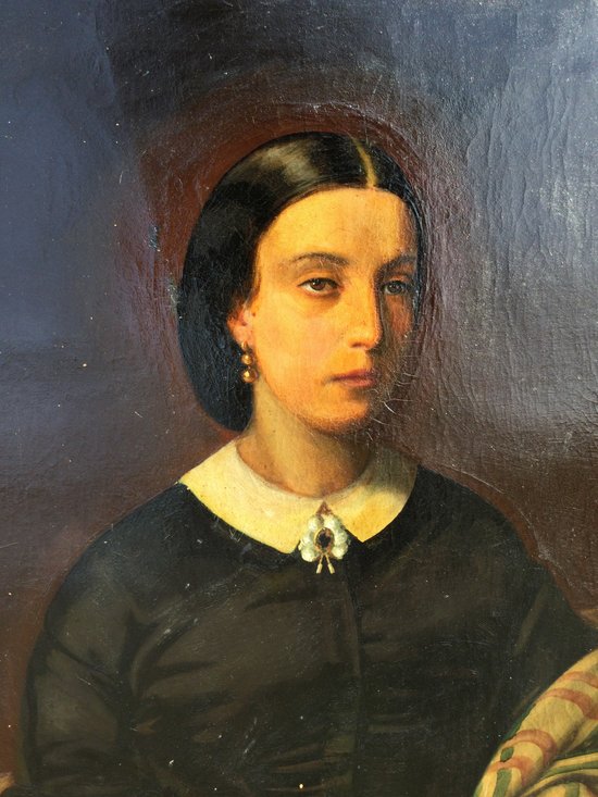 Portrait of a woman with a book.1860